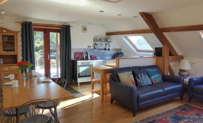 Plenty of space for families and groups in the Tollant barn conversion with hot tub. Walk straight out onto the roof garden to eat al fresco and enjoy